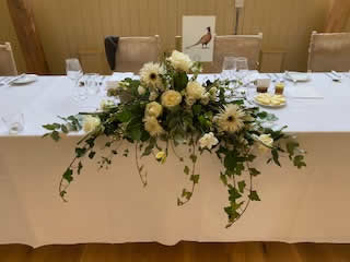 Autumn colours or whatever theme you want. We can design any floral arrangement bespoke around your needs