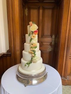 Wedding cake with simple yet striking flowers