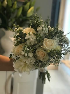 Stunning cream arrangement for your brides bouquet here in Bristol